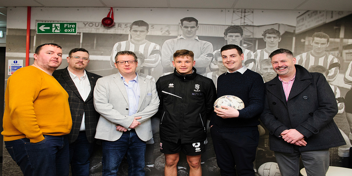 A few members of the James Oliver team at Lincoln Football Club