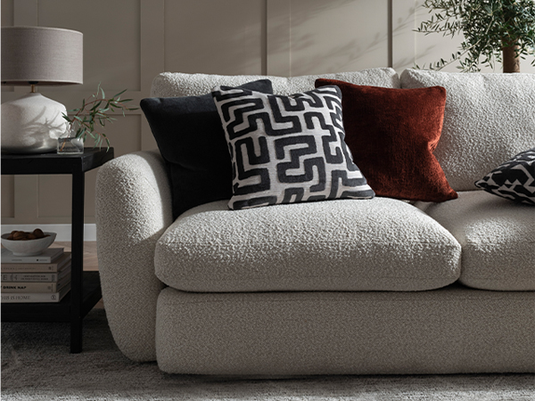 Comfortable looking sofa with cushions