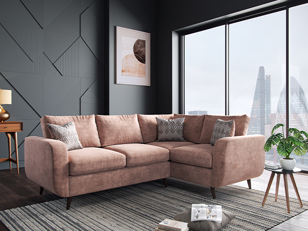 Pink corner sofa in a modern London apartment